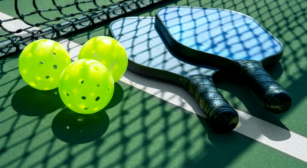 pickleball-racquet-and-balls-1024x562-edit